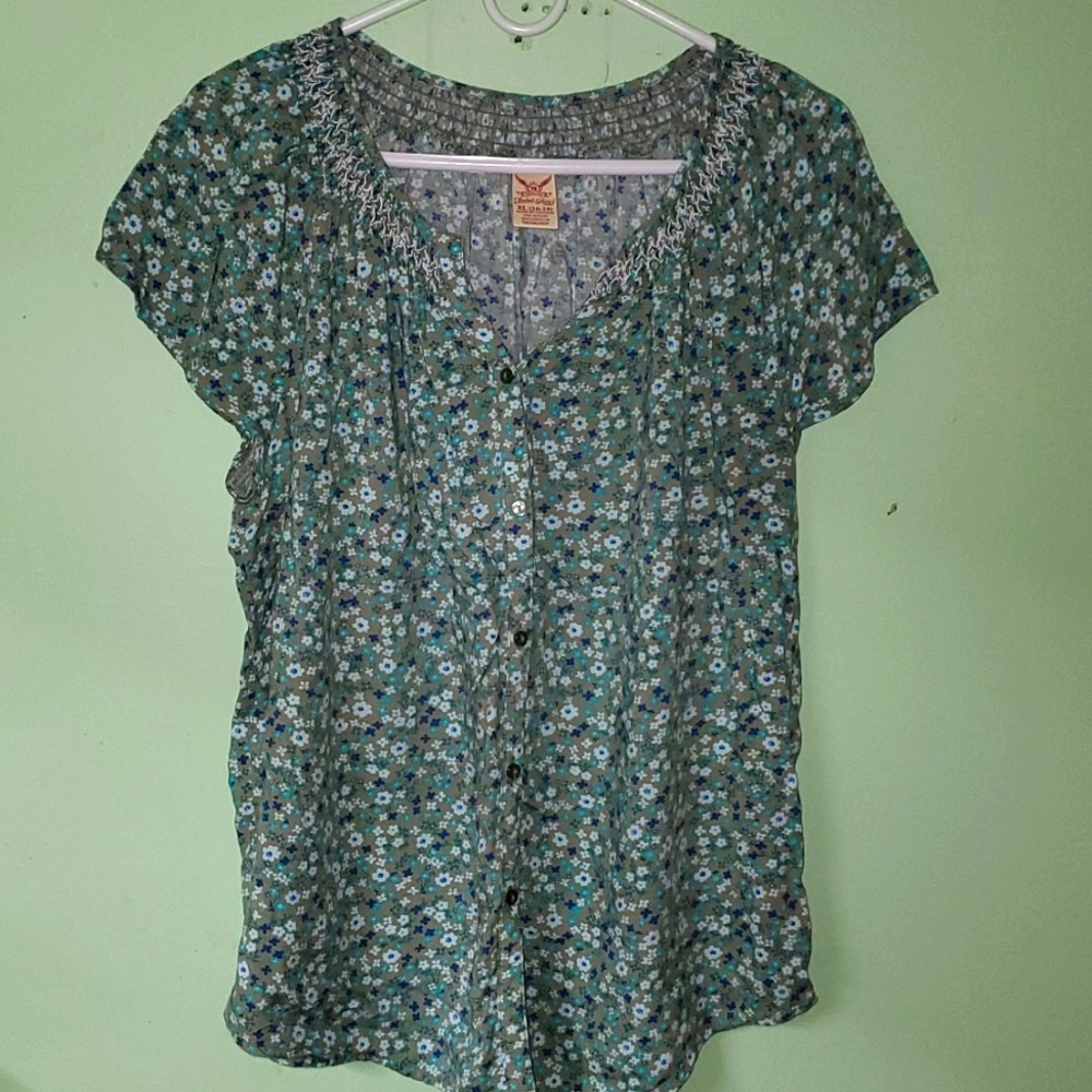 Green floral blouse